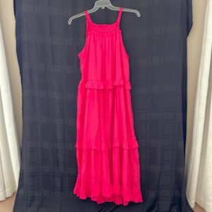 Stunning fuchsia sleeveless ruffled maxi dress. New, without tags. Lined.